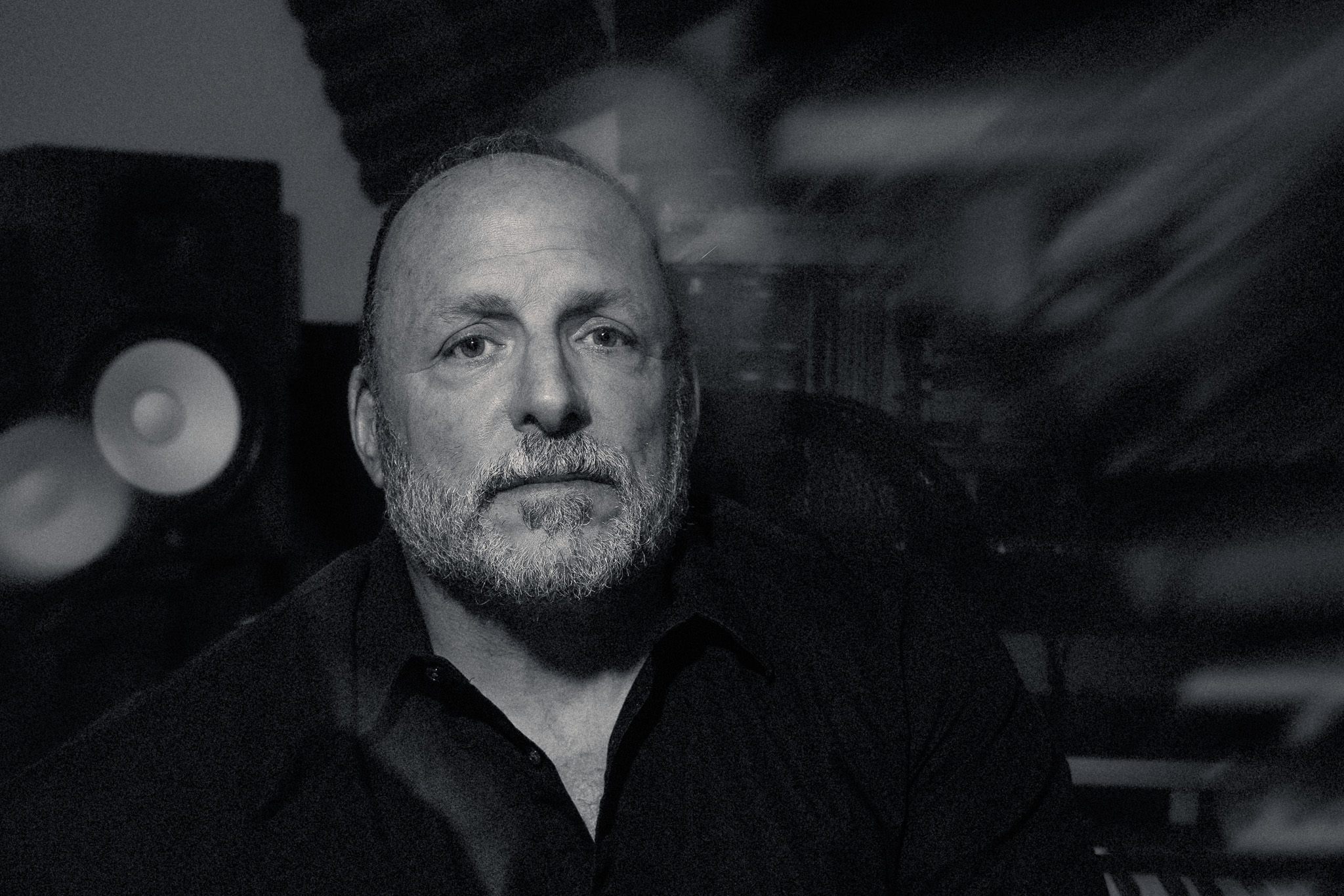 Black-and-white portrait of Peter Amato in his studio, photographed by his son
